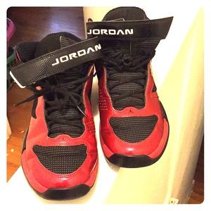 Old school jordens.shiny red an black size 9